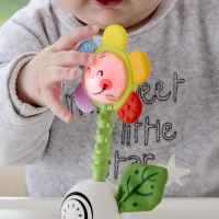 Дрънкалка и чесалка за зъби Hape, Цвете-4h6y4.jpeg